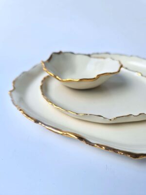 white porcelain and gold plates set